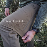 close side view of man showing fabric stretching on his hiking pants