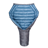 A blue and gray StormLoft Down TopQuilt, designed for use as a backpacking top quilt to insulate against cold drafts.