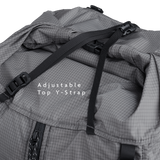 Close-up of the Outdoor Vitals Shadowlight backpack’s roll-top closure with adjustable top strap and buckle for secure compression.