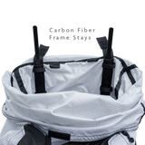 Inside view of backpack showing integrated carbon fiber frame stays for load support.
