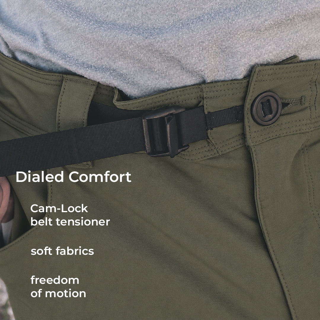 close view of camlock belt tensioner on green backpacking pants