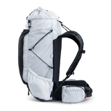 Right side view of ultralight backpack showing compression system and side pocket design.