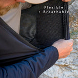 side view of man demonstrating flexibility and stretch of fleece hoodie fabrics