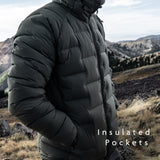 Outdoor Vitals Vantage Alpine Down Jacket in olive green with insulated hand pockets shown in use on a windy ridgeline.