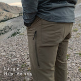 close side view of large zippered hip vents on men's hiking pants