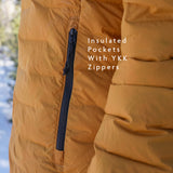 Close-up of insulated jacket side pocket with YKK zipper, designed to keep hands warm and secure small items.