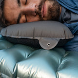 close view of man side sleeping with lightweight backpacking pillow