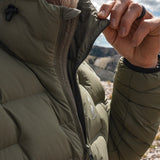 Detail of the high collar and insulated design of the Outdoor Vitals Vantage jacket, built to seal in warmth in cold, windy environments.