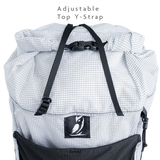 Top view of backpack showing adjustable Y-strap used to secure bulky gear.