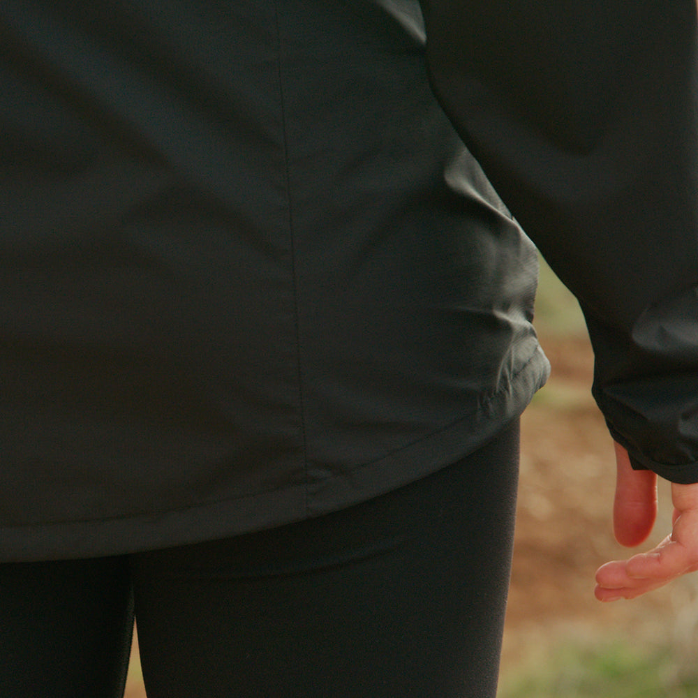 close view of drop back hem of windbreaker jacket