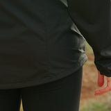 close view of drop back hem of windbreaker jacket