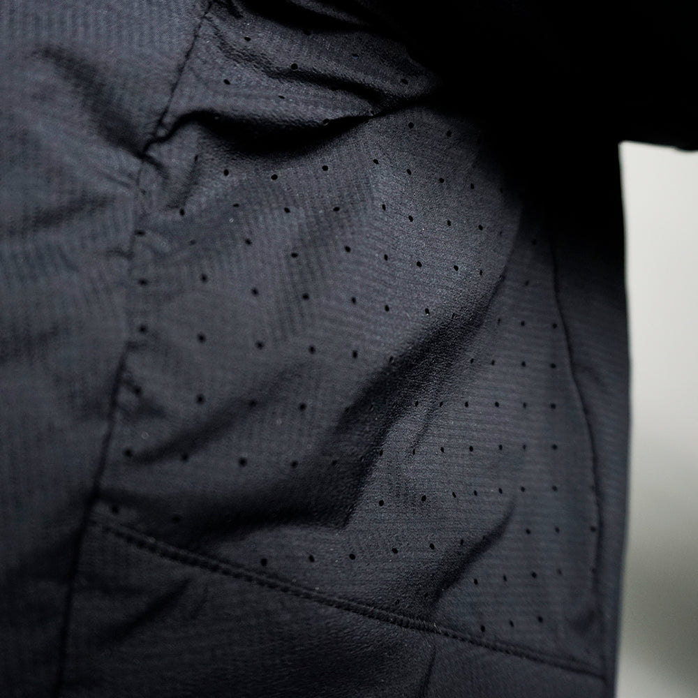 close view from side of armpit ventilation in synthetic active mid layer