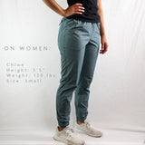 side view of blue joggers on woman