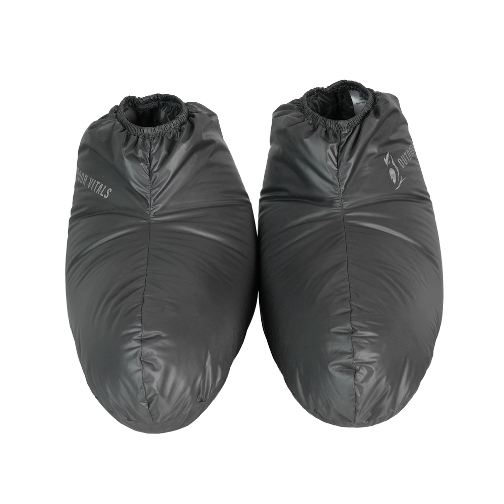 Pair of ultralight down camp booties front view with elastic ankle opening
