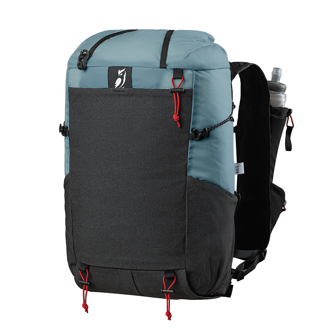 Blue and black fastpack with visible brand logo
