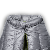 close view of snap closure near insulated draft collar of down top quilt. all-groups