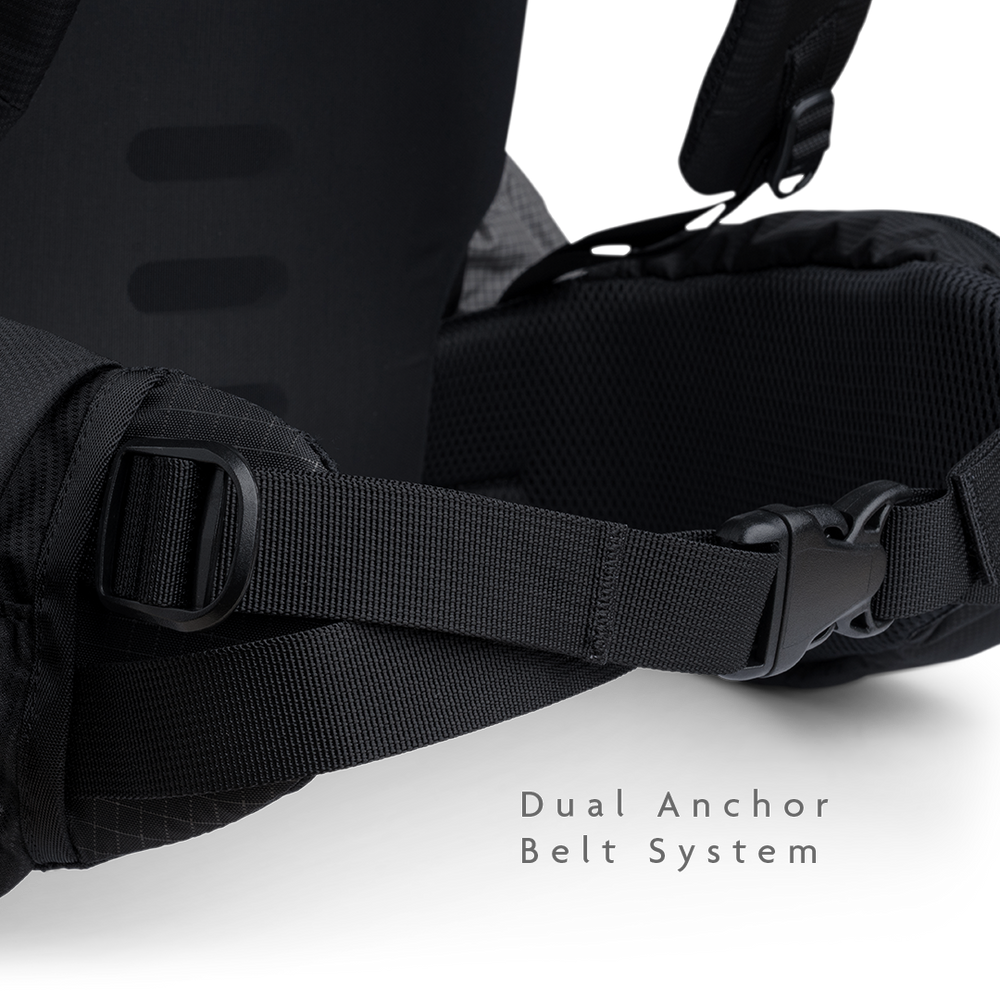 Close-up of the Shadowlight 60 backpack hip belt buckle and strap cinch system for adjusting fit and load distribution.