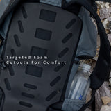 Close-up of Shadowlight backpack back panel showing targeted foam cutouts designed for comfort and ventilation.