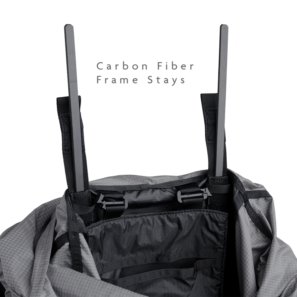 Top view of the Shadowlight 60 backpack interior showing removable carbon fiber frame stays for support and structure.