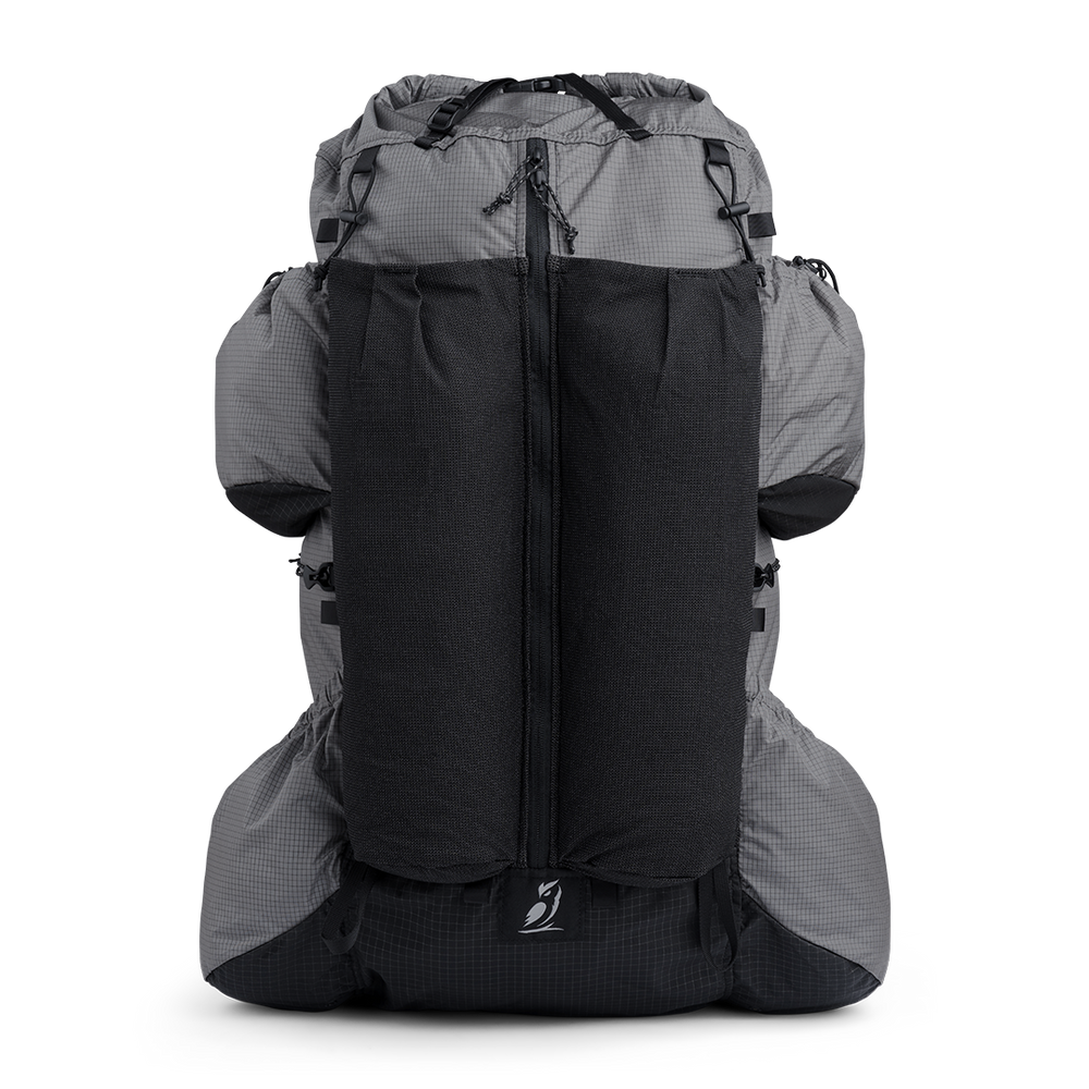 Front view of the Shadowlight 60 ultralight backpack with large external mesh pocket and roll-top closure system.