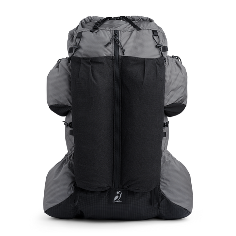 Front view of the Shadowlight 60 ultralight backpack with large external mesh pocket and roll-top closure system.