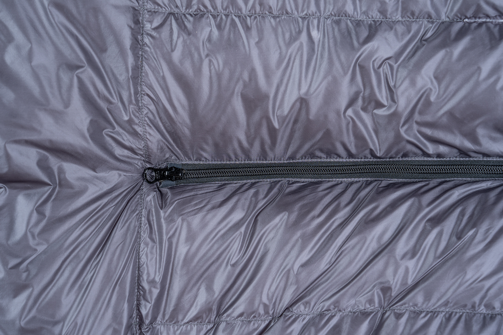 close view of secondary zipper slider on sleeping bag