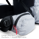 Close-up of large hip belt pocket on backpack designed for one-handed access.