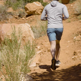 rear view of men's shorts on trail runner