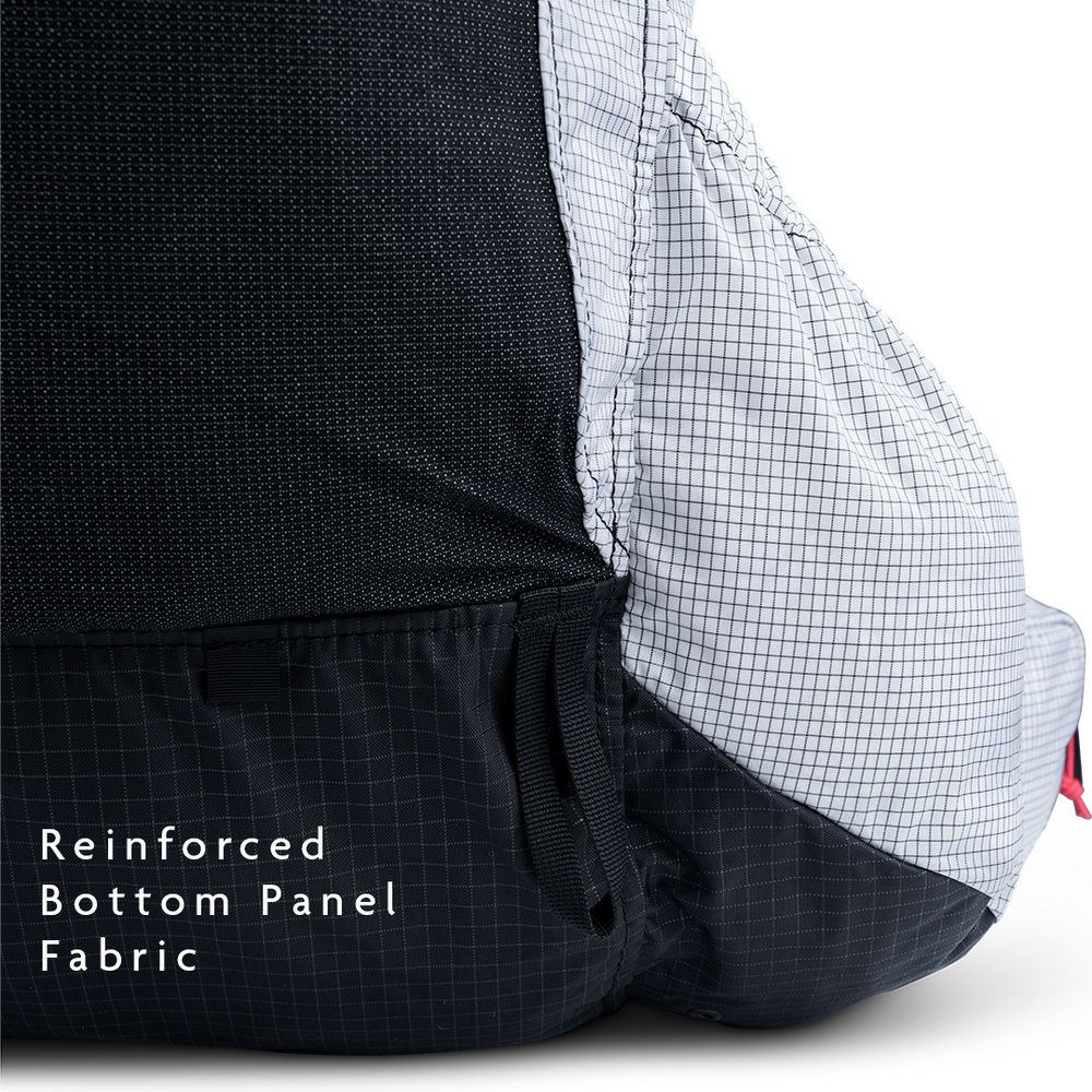 Close-up of backpack reinforced bottom panel fabric for abrasion resistance.