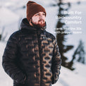 A man wearing a black puffer jacket and brown knit beanie stands in a snowy outdoor setting. White text on the right reads 'Built For Backcountry Comfort' and 'warm into the 30s with proper layers.