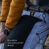Front stretch mesh pocket on backpack made from durable UltraStretch fabric.