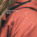 Close-up of a terracotta-colored waterproof jacket with water droplets on the surface, featuring a black collar trim and white text overlay that reads 'DWR Treated Shell'.