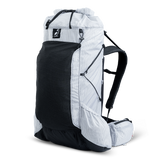 Angled front view of ultralight backpack highlighting front mesh pocket and compression system.