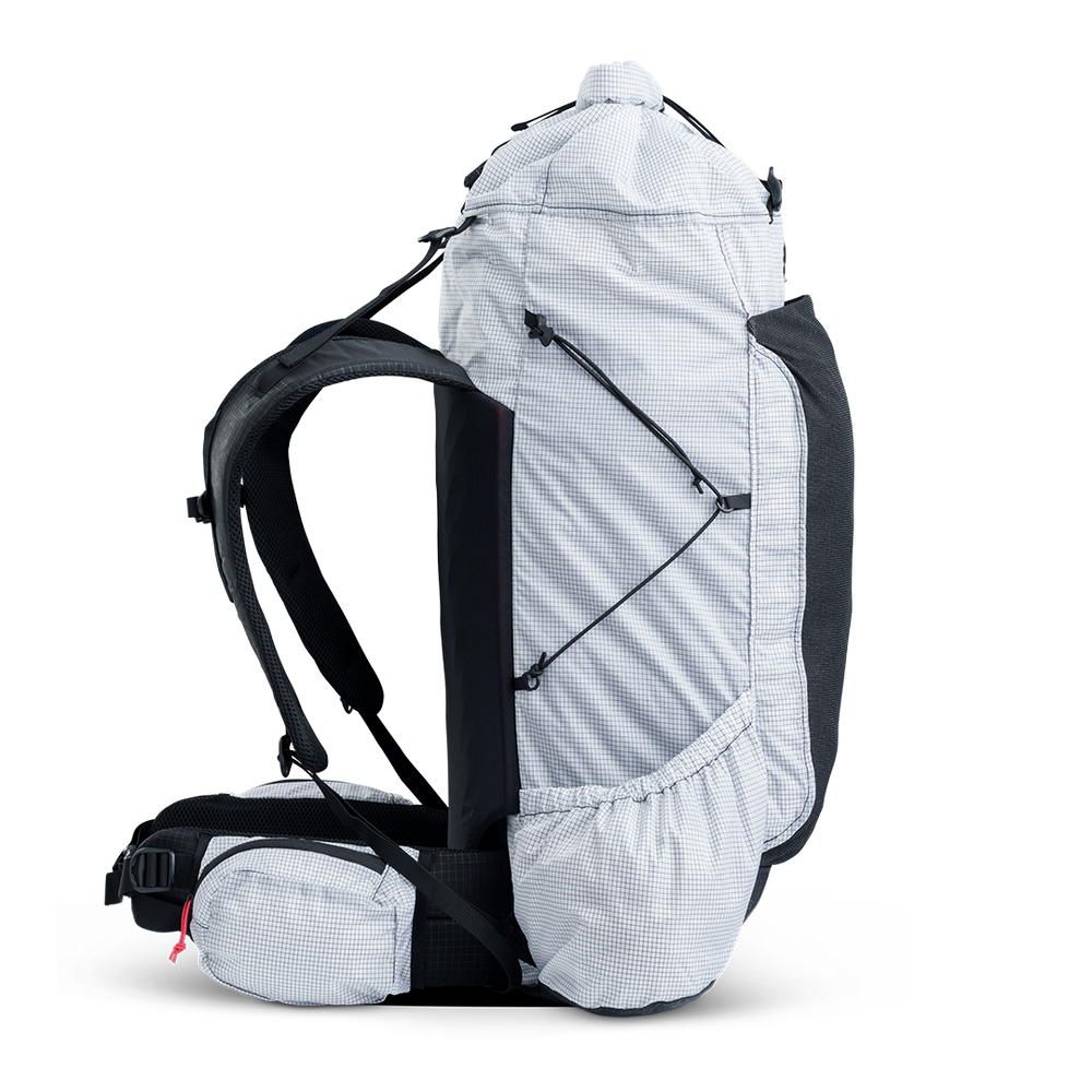 Left side view of ultralight backpack showing compression cords and side storage pocket.