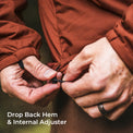 Close-up of a person's hands adjusting the hem and internal zipper of a jacket, with text overlay reading 'Drop Back Hem & Internal Adjuster'.