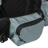 Side profile of the Shadowlight Ultralight Backpack highlighting its spacious hip belt pockets