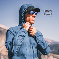 man wearing insulated mid layer with fitted hood
