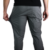 rear view of men's gray Skyline Trial Joggers being stretched