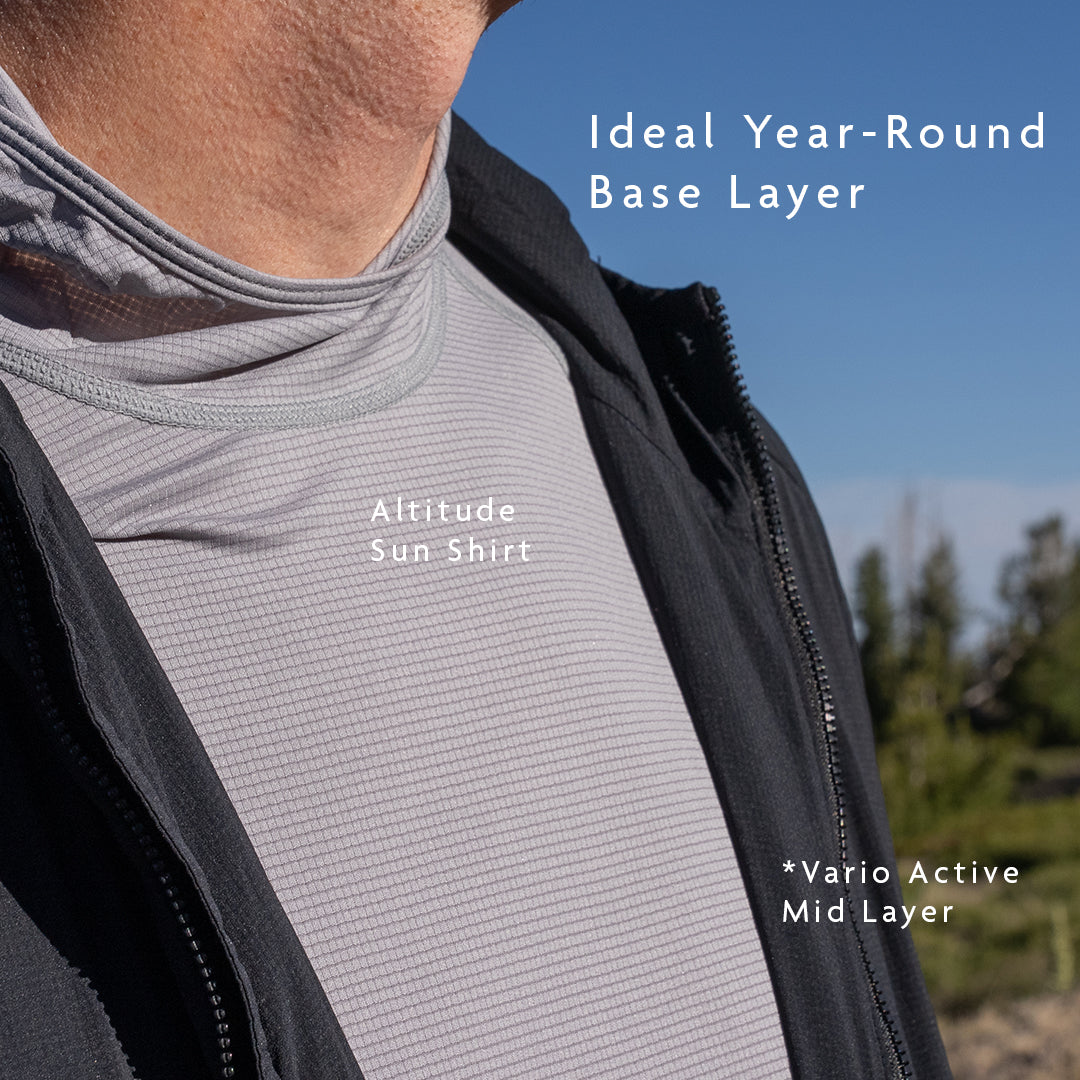 Gray - close view of sun hoodie being worn beneath ultralight mid layer
