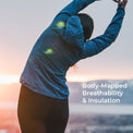 A woman in a blue hooded athletic jacket and black leggings stretches overhead at sunset, with the text 'Body-Mapped Breathability & Insulation' on the right side.
