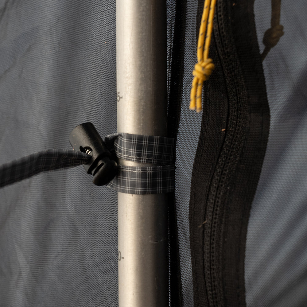 Trekking pole attachment point inside ultralight trekking pole tent