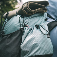 close view of the upper side pocket on the Shadowlight backpack