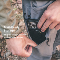 close view of angled pocket and phone sleeve on technical hiking pants
