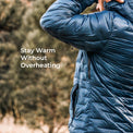 A close-up of a person wearing a dark blue quilted puffer jacket outdoors, with blurred trees in the background and the text 'Stay Warm Without Overheating' on the left.