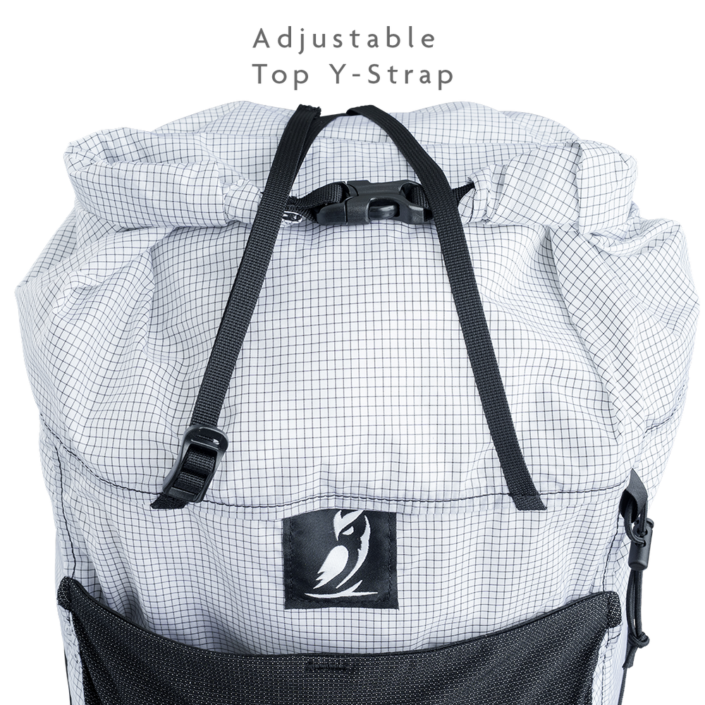 Top view of backpack showing adjustable Y-strap used to secure bulky gear.